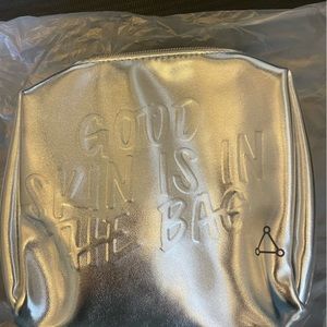 NWOT NEW Silver Chrome Make Up Cosmetics Stationary Bag.